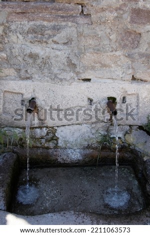 village fountain with pure drinking water