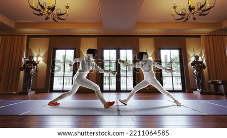 Two female fencing athletes fight in old fencing hall Royalty-Free Stock Photo #2211064585