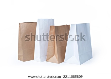 Different types of white and brown Paper bag  on white background. Mockup for design. - image