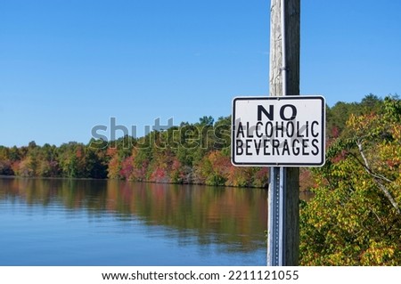 No alcoholic beverages sign on lake Royalty-Free Stock Photo #2211121055