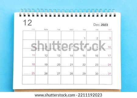 close-up of calendar december of november 2023 top view on a blue background Royalty-Free Stock Photo #2211192023