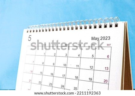 close-up of calendar month of May  2023 on a blue background