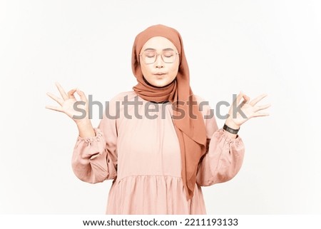 Meditation Gesture of Beautiful Asian Woman Wearing Hijab Isolated On White Background 