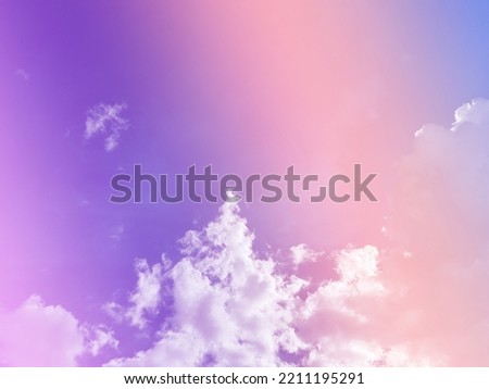 beauty sweet pastel purple orange     colorful with fluffy clouds on sky. multi color rainbow image. abstract fantasy growing light