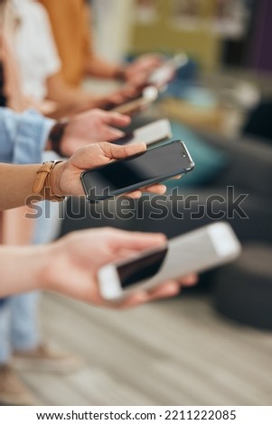 Social media, hands and row of smartphone people for internet app communication or wifi streaming. Phone consumer group holding device for digital leisure and online entertainment in a line Royalty-Free Stock Photo #2211222085