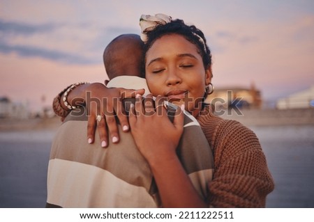 Love, peace and calm black couple hug while relax on outdoor date for freedom, bonding and enjoy quality time together. Romance, vacation and young gen z man and woman on romantic holiday in Jamaica Royalty-Free Stock Photo #2211222511