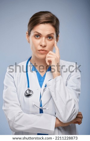 Serious doctor woman isolated close up face isolated portrait.