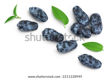 Fresh honeysuckle blue berry isolated on white background with full depth of field. Top view with copy space for your text. . Flat lay. Royalty-Free Stock Photo #2211228949