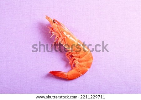 prawns are placed on a Purple cloth background picture