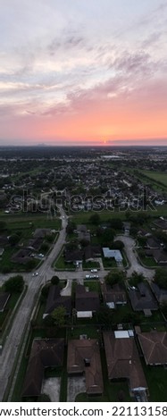Aerial View of a Sunet over Houston with the city in the background