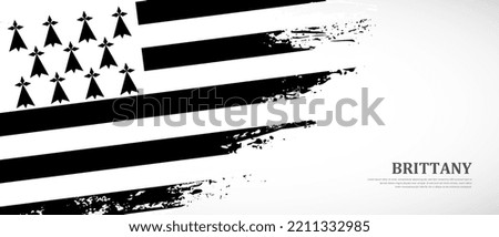 National flag of Brittany with textured brush flag. Artistic hand drawn brush flag banner background