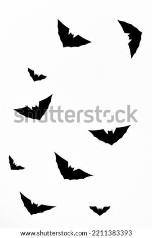 Halloween decorations concept, Silhouette of flying horror bat halloween symbol on white background.