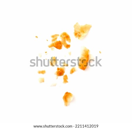 Falling crumbs by puff dough isolated on white Royalty-Free Stock Photo #2211412019