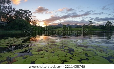 Sunset over a lake at Mount Samson, QLD
