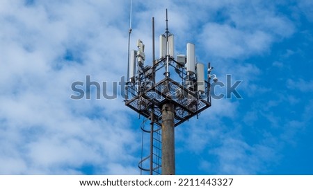 Modern tower 5 g on the background of a cloudy sky. Telecommunication antenna. Repeater. Communication tower. Estonia Royalty-Free Stock Photo #2211443327