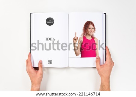 Young girl having an idea printed on book