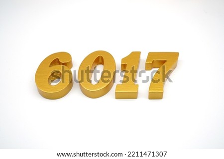     Number 6017 is made of gold-painted teak, 1 centimeter thick, placed on a white background to visualize it in 3D.                                
