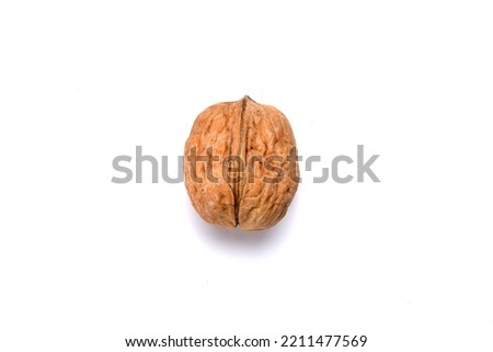 Fresh Nut in the wooden bowl, Organic almonds, almonds border white background, Almond, nuts on a dark wooden background. Healthy snacks. Top view. Free space for text, brown dry dates, black dry date