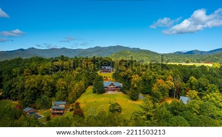  is the highest point in the U.S. state of Georgia. It is located in the northeastern part of the state in the Blue Ridge Mountains on the border between Towns and Union counties south of the city of  Royalty-Free Stock Photo #2211503213