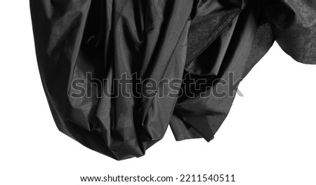 Black luxury fabric, drapery hanging texture isolated on white