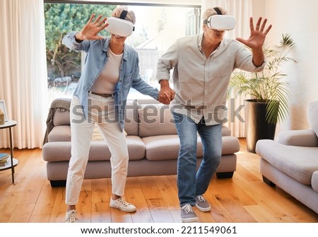 Metaverse, vr headset and senior couple in fun 3d play game in lockdown house or home living room. Virtual reality, cyber esports and digital gaming for retirement elderly man and woman holding hands