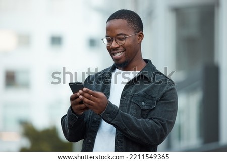 Black man, phone and smile in city reading email, social media or blog on internet. Man, glasses and smartphone outside in Chicago happy with communication on mobile app via 5G web while outdoors