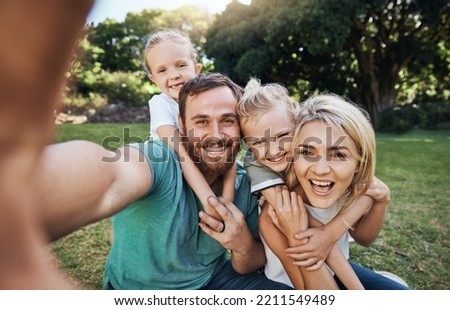 Nature, selfie and portrait of a happy family on a picnic together in outdoor green garden. Happy, smile and parents playing, hugging and bonding with children outside in backyard or park in canada.