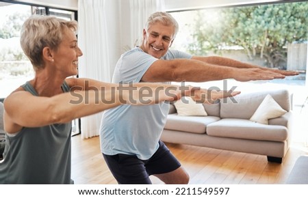 Fitness, retirement and couple squat in home for senior body wellness and vitality in Canada. Happy elderly people in marriage enjoy stretching workout to bond together in living room. Royalty-Free Stock Photo #2211549597