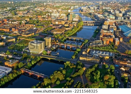 Aerial view of the River Clyde and Glasgow City during oncoming storm Royalty-Free Stock Photo #2211568325