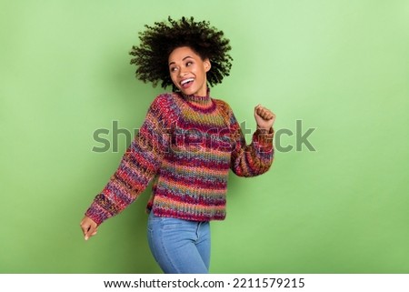 Photo of excited positive person enjoy free time discotheque isolated on green color background