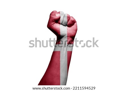 Strong man's hand in battle signal with Denmark flag on white background.