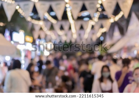 Abstract blur image of day market on street for background.