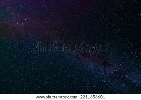 starry multicolored night sky with a bright milky way and galaxies. Astrophotography with many stars and constellations Royalty-Free Stock Photo #2211656601
