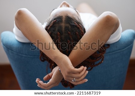 Peace, home and girl relax in chair for positive mindset, freedom and mental health wellness back view. Calm black woman sleeping on stool for mental wellbeing, health or stress relief while dreaming Royalty-Free Stock Photo #2211687319