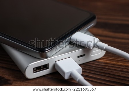 Portable power bank in a charger smartphone process.