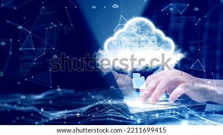 A person is connecting to the Internet through a notebook computer to upload and download data to cloud technology or edge computing. abstract white cloud polygon binary code on dark blue background. Royalty-Free Stock Photo #2211699415