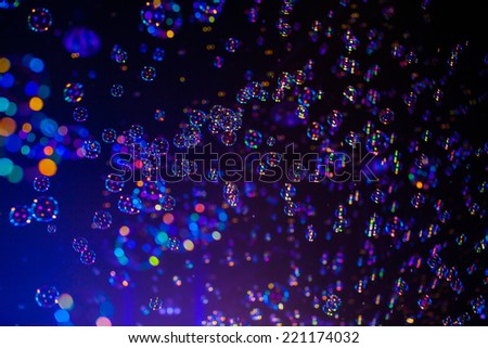 Abstract colorful soap bubbles wallpaper isolated on black background