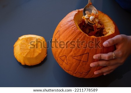 Emptying the pumpkin pulp for halloween. Top view