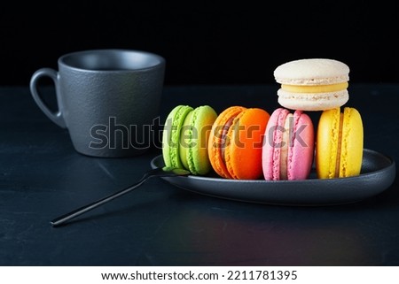 Colorful macarons cakes. Small French cakes. Sweet and colorful french macaroons