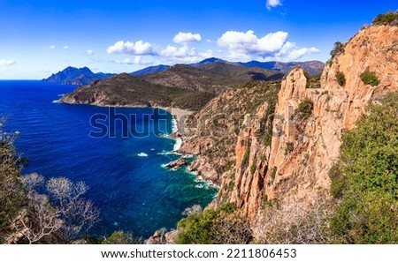 Corsica, France. Amazing red rocks of Calanques de Piana. famous route and travel destination in west coast of the island in gulf of Porto Royalty-Free Stock Photo #2211806453
