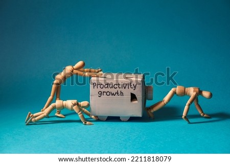 Productivity grouws concept. Workers push the vehicle.