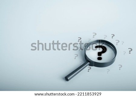 Magnifying glass and question mark sign icon. Problems and root cause analysis concept. copy space for background or text. Royalty-Free Stock Photo #2211853929