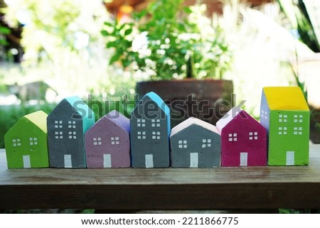 Colorful Miniature little houses village Home  and Real Estate concept