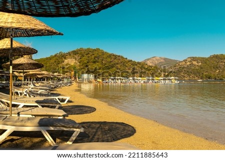 The beach in the lagoon of Oludeniz in the Fethiye area. Turkey. A relaxing holiday in summer.