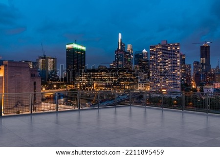 Skyscrapers Cityscape Downtown, Philladelphia Skyline Buildings. Beautiful Real Estate. Night time. Empty rooftop View. Success concept.