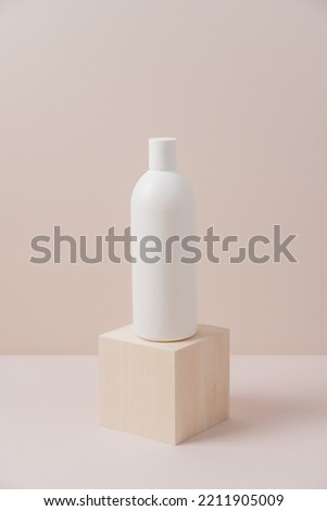 Cosmetic Packaging Mockup bottle on wooden podium on beige background. Treatment spa beauty skincare. Healthcare and medicine concept