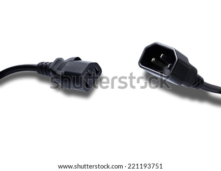 A close up of an IEC electrical connection, also known as a "jug plug".
