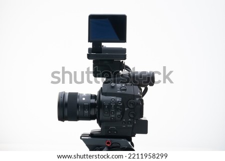 Digital Documentary Filmmaker  Camera on a Tripod with a Portrait Photography Lens white background 35mm