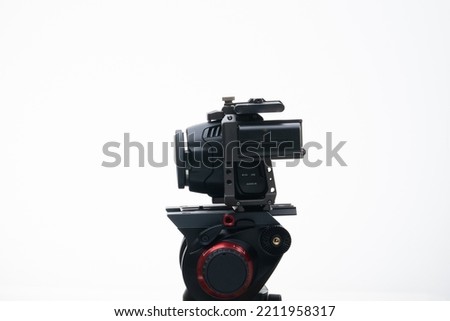 4k 6k Digital Cinema Camera on a Tripod with an No Lens white background 
