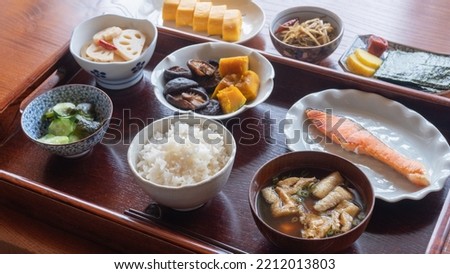 Eat a sumptuous Japanese meal.There are lots of rice, miso soup and side dishes. Royalty-Free Stock Photo #2212013803